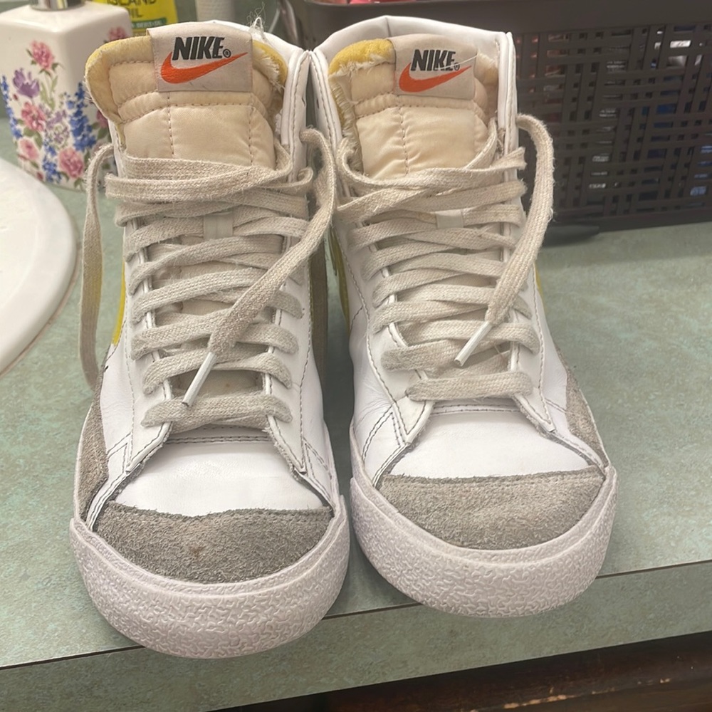 Nike blazers , yellow sign, small marks but still look new